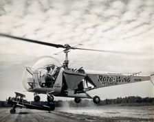 Sir Gordan Covell in a helicopter, Beltsville, Maryland, 1948. Creator: Unknown