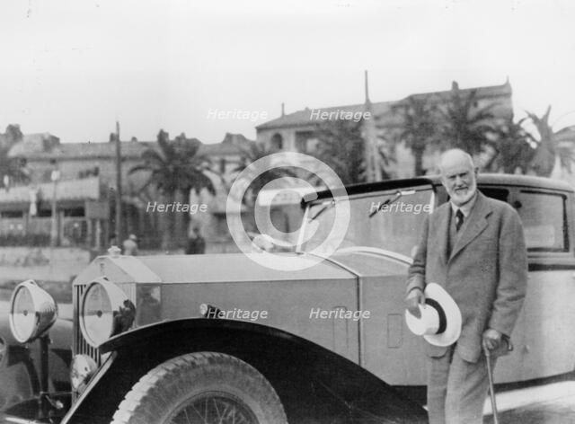 Sir Henry Royce, with Rolls-Royce car. Artist: Unknown