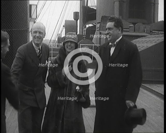 Sir Henry Segrave AKA Major Segrave And His Wife Lady Doris Segrave On a Ship With a Male..., 1927. Creator: British Pathe Ltd.