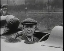 Sir Henry Segrave AKA Major Segrave's Climbing Into Sunbeam Watched By a Crowd of Civilians, 1927. Creator: British Pathe Ltd