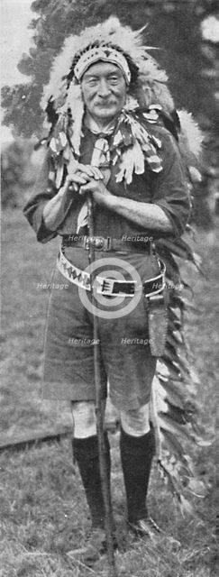 'Sir Robert Baden-Powell, arrayed in the dress of a Red Indian tribe', c1925. Creator: Unknown.