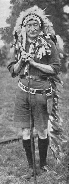 Sir Robert Baden-Powell, arrayed in the dress of a Red Indian tribe c1925. Creator: Unknown