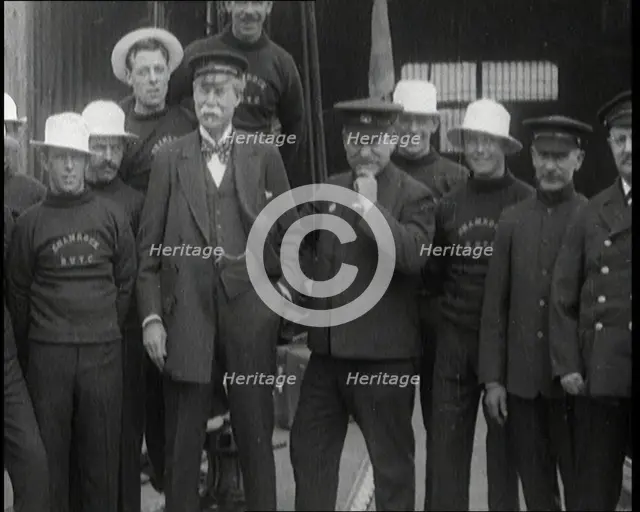 Sir Thomas Lipton Standing With the Crew of the Ship 'The Shamrock', 1920. Creator: British Pathe Ltd.