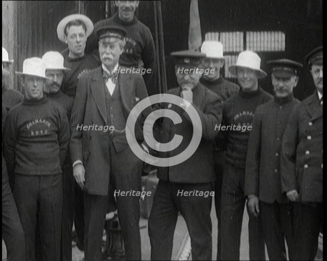 Sir Thomas Lipton Standing With the Crew of the Ship 'The Shamrock', 1920. Creator: British Pathe Ltd.