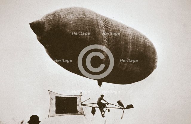 Sky cycle below a balloon, early 1900s.  Creator: Unknown.