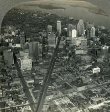Skyscrapers of Downtown Detroit - Michigan Ave. to Detroit River and Belle Isle Park c1930s. Creator: Unknown