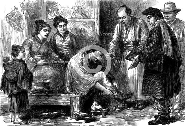 Sketches in Japan, by our special artist: the first pair of boots, 1873. Creator: Unknown.