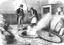 Sketches in the Bank of England: burning returned bank-notes, 1872. Creator: Unknown