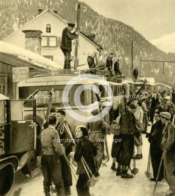 Skiers arriving at St Anton am Arlberg, Austria, c1935.  Creator: Unknown.
