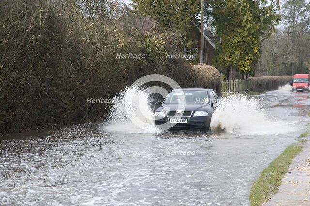 Skoda driving fast through floodwater at Beaulieu 2008. Artist: Unknown.