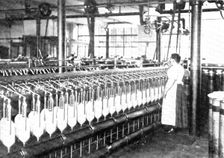 Slubbing, during which the slivers are drawn out still more, and are wound on bobbins, 1909. Creator: Unknown
