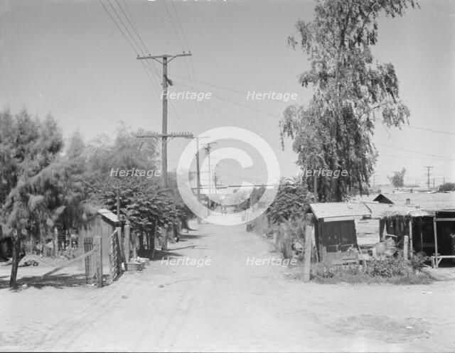 Slums of Brawley, Mexican field workers' homes, Imperial Valley, California, 1936. Creator: Dorothea Lange.