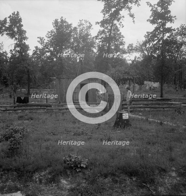 Slab house in clearing east of Atoka, Oklahoma, Atoka County, 1938. Creator: Dorothea Lange.