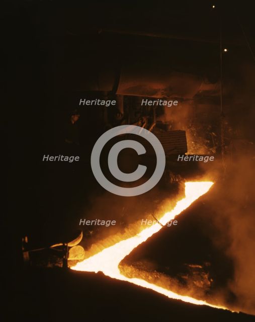 Slag run-off from one of the open hearth furnaces..., Republic Steel Corp., Youngstown, Ohio, 1941. Creator: Alfred T Palmer.