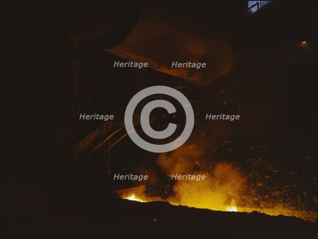 Slag run-off from open hearth furnace, Republic Steel Corp., Youngstown, Ohio, 1941. Creator: Alfred T Palmer.