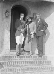 Slater, Mrs., and Arnold Genthe, with another friend on the steps of a house in Long Beach, 1924. Creator: Arnold Genthe