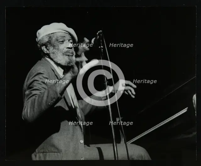 Slim Gaillard on the piano at the Forum Theatre, Hatfield, Hertfordshire, 1986. Creator: Denis Williams.