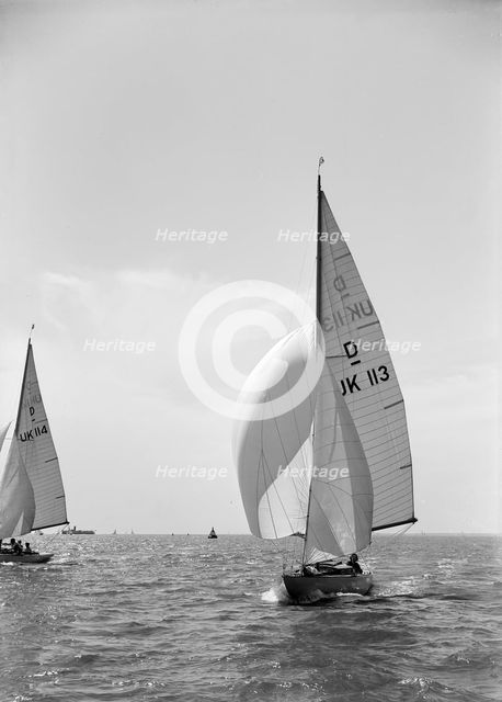 Sloop (Dragon? class) sailing with spinnaker, c1938. Creator: Kirk & Sons of Cowes.