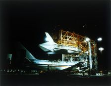 Space Shuttle and 747 carrier plane in Mate-Demate Device. Creator: NASA