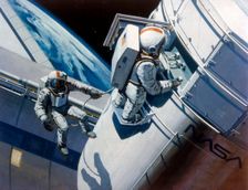 Space Shuttle - artist's concept of spacewalk, 1980s. Creator: NASA