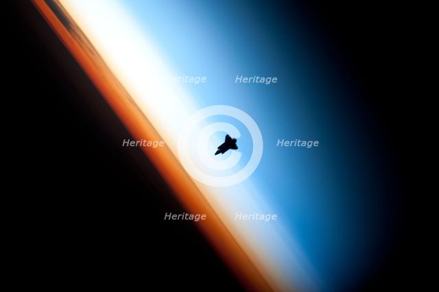 Space Shuttle Endeavour over Earth, c2010.  Creator: NASA.
