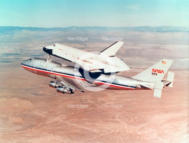 Space Shuttle Orbiter mounted on top of a Boeing 747 carrier aircraft, 1977.  Creator: Unknown.