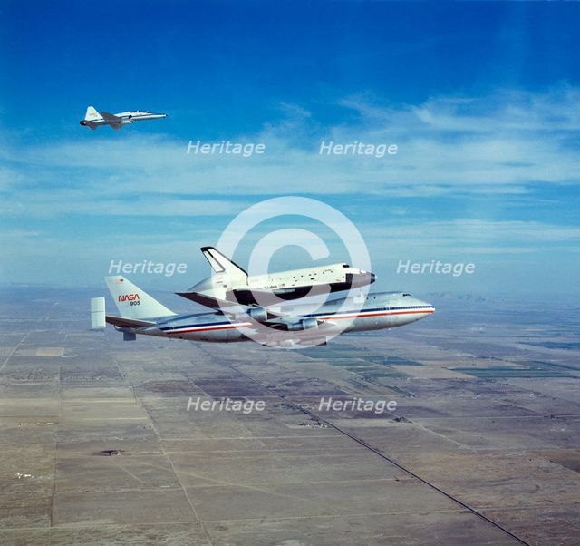 Space Shuttle Orbiter 'Columbia' on Boeing 747 Shuttle Carrier, 1980s. Creator: NASA.