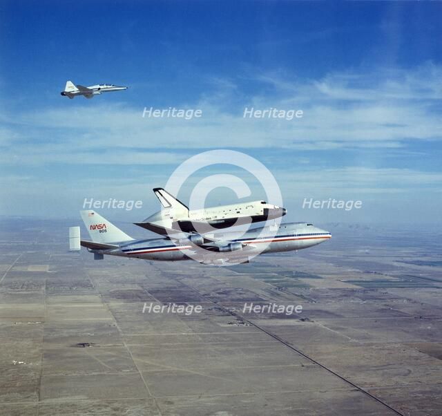 Space Shuttle Orbiter 'Columbia' on Boeing 747 Shuttle Carrier, 1980s. Creator: NASA.
