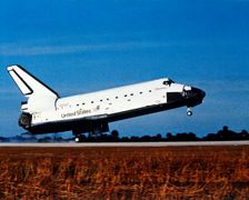 Space Shuttle Orbiter Discovery landing at Kennedy Space Center, Florida, USA, 1980s. Creator: NASA