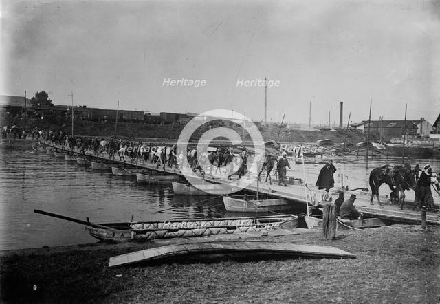 Spahis cross boat bridge, Compiegne, 1914. Creator: Bain News Service.
