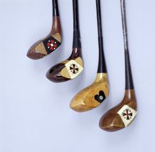 Spalding wooden clubs with coloured Fancy Face inserts, American, 1920s. Artist: Spalding