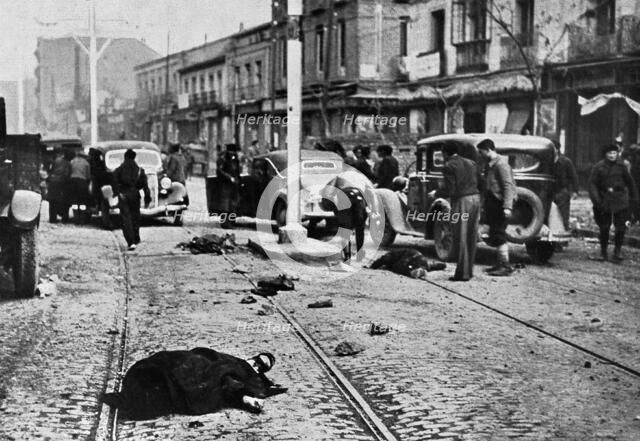 Spanish Civil War 1936-39. Madrid, an Avenue at the north of the city, moments after an air raid,…