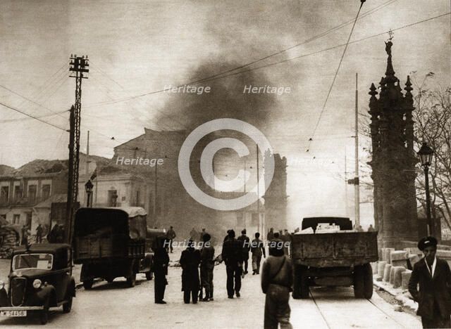 Spanish Civil War 1936-39. Siege of Madrid, houses burned by an air raid near the bridge of Toled…