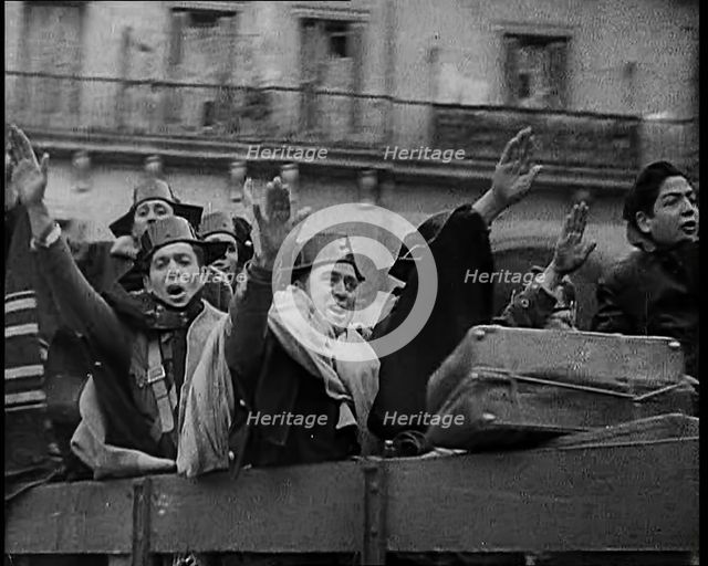 Spanish Fighters on the Back of a Lorry Making Fascist Salutes and Celebrating the Victory..., 1939. Creator: British Pathe Ltd.