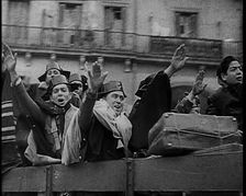 Spanish Fighters on the Back of a Lorry Making Fascist Salutes and Celebrating the Victory..., 1939. Creator: British Pathe Ltd