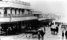 Spectators watch rising floodwaters in Melbourne Street, South Brisbane, 1890. Creator: John Jackson Hogg
