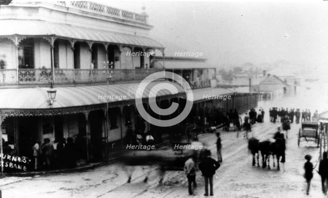 Spectators watch rising floodwaters in Melbourne Street, South Brisbane, 1890. Creator: John Jackson Hogg.