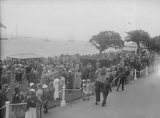 Spectators watching yachts at Cowes, Isle of Wight. Creator: Kirk & Sons of Cowes