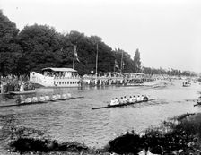 Spectators watching a boat race during Eights Week, Oxford, c1860-c1922. Artist: Henry Taunt