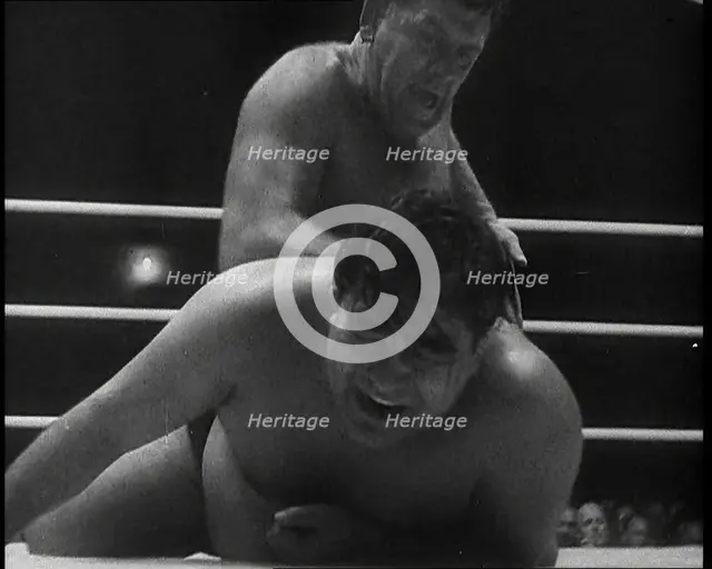 Spectators Watching a Wrestling Match, 1930s. Creator: British Pathe Ltd.