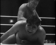 Spectators Watching a Wrestling Match, 1930s. Creator: British Pathe Ltd