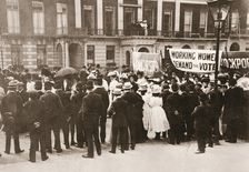 Spectators gather on Portland Place to watch the Women's Sunday procession, London, 21 June 1908