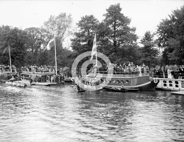 Spectators on the University barges watching a boat race during Eights Week, Oxford, c1860-c1922. Artist: Henry Taunt