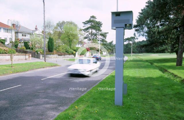 Speed Camera and traffic. Artist: Unknown.