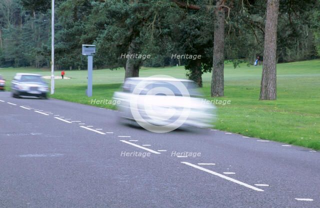Speed Camera and road markings. Artist: Unknown.