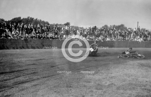 Speedway race at Lea Bridge Stadium, Leyton, London, 1928.   Artist: Bill Brunell.