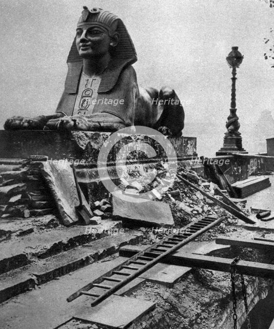 Sphinx damaged by a German bomb dropped on the Embankment, 4th September 1917, (1935). Artist: Unknown