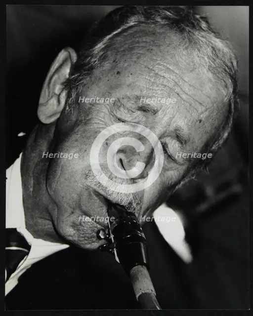 Spike Robinson playing tenor saxophone at The Fairway, Welwyn Garden City, Hertfordshire, 1992. Creator: Denis Williams.