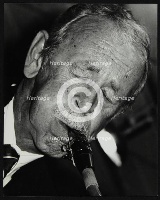 Spike Robinson playing tenor saxophone at The Fairway, Welwyn Garden City, Hertfordshire, 1992. Artist: Denis Williams