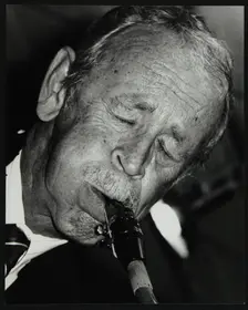 Spike Robinson playing tenor saxophone at The Fairway, Welwyn Garden City, Hertfordshire, 1992. Creator: Denis Williams